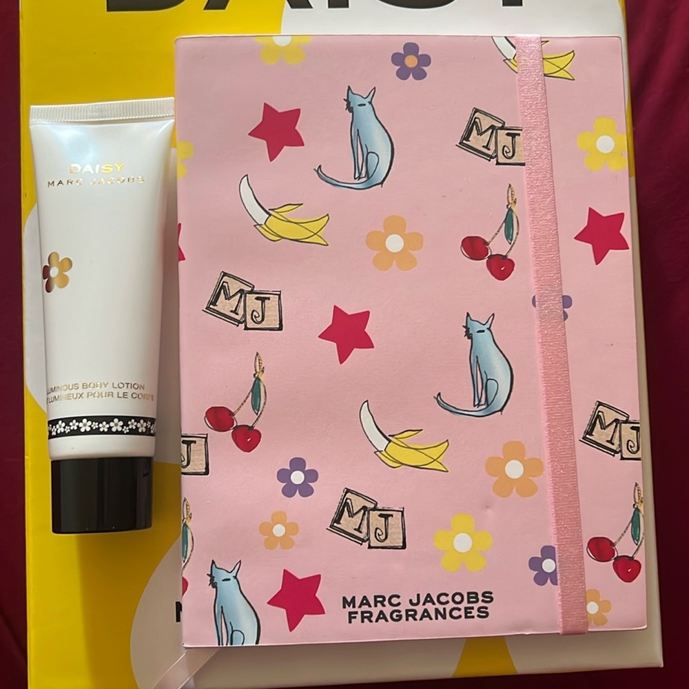 Marc Jacobs lotion and notebook.